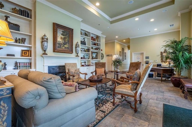 2304 Village Blvd, Rome, GA 30161 - living room with ornamental molding, recessed lighting, built in features, a high end fireplace, and stone finish flooring