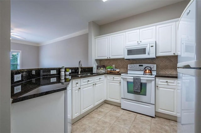 2304 Village Blvd, Rome, GA 30161 - kitchen with white appliances, tasteful backsplash, ornamental molding, white cabinets, and a sink