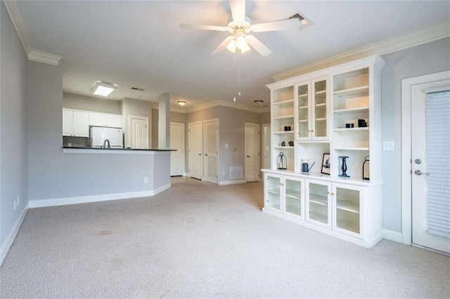 2304 Village Blvd, Rome, GA 30161 - unfurnished living room with crown molding, light colored carpet, baseboards, and ceiling fan