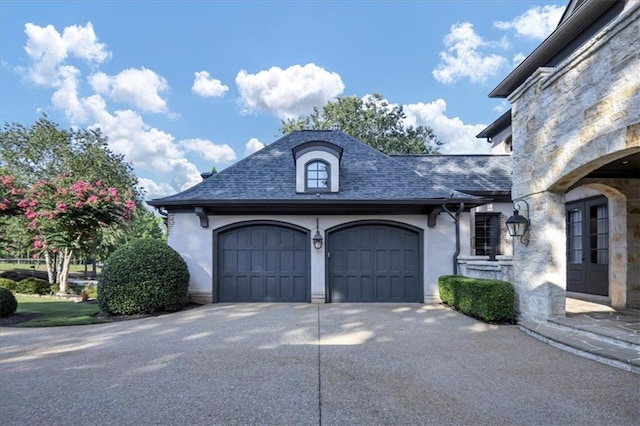 exterior space with a garage