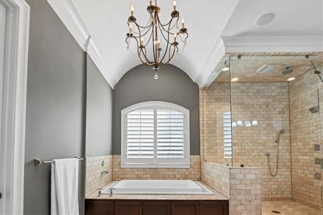 bathroom with lofted ceiling, crown molding, separate shower and tub, and an inviting chandelier