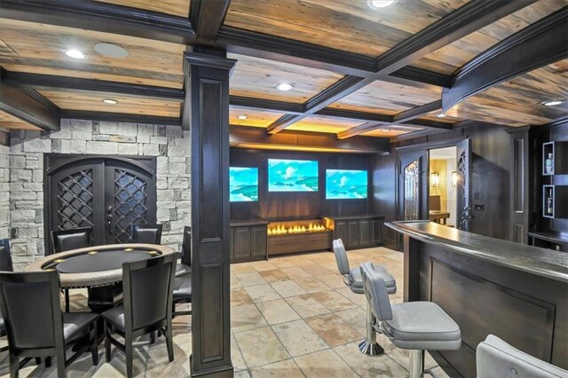 interior space with light tile patterned floors, wood ceiling, french doors, and beamed ceiling