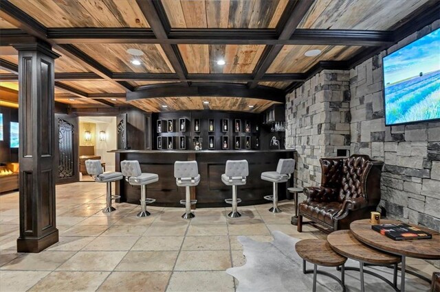 interior space featuring wooden ceiling, light tile patterned floors, beamed ceiling, and coffered ceiling