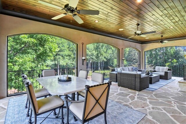 view of patio / terrace with ceiling fan and an outdoor hangout area