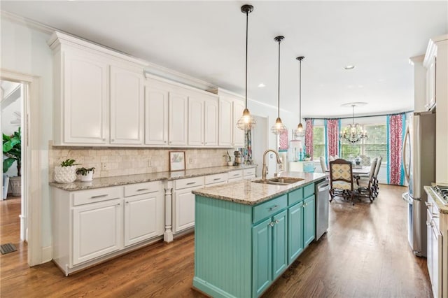 3215 Kylee Dawn Cir, Lawrenceville, GA 30045 - kitchen with a sink, white cabinets, appliances with stainless steel finishes, and a center island with sink