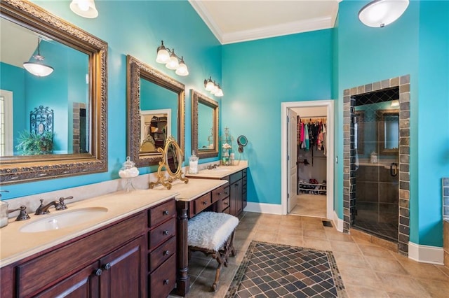3215 Kylee Dawn Cir, Lawrenceville, GA 30045 - bathroom featuring baseboards, a shower stall, crown molding, and vanity