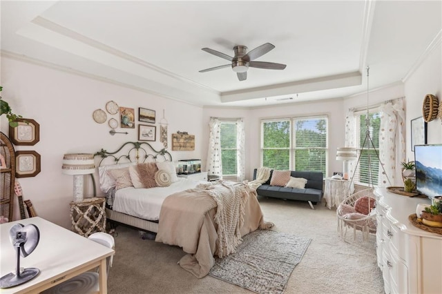 3215 Kylee Dawn Cir, Lawrenceville, GA 30045 - bedroom with crown molding, ceiling fan, light carpet, and a tray ceiling