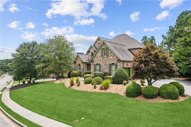 3215 Kylee Dawn Cir, Lawrenceville, GA 30045 - view of front of home with a front lawn and stone siding
