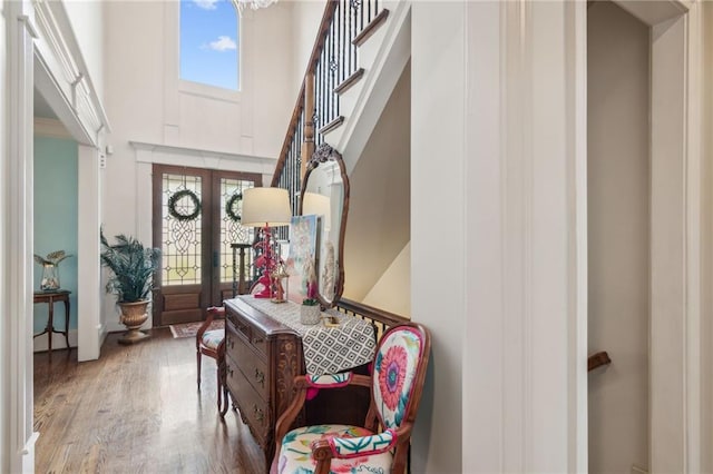 3215 Kylee Dawn Cir, Lawrenceville, GA 30045 - foyer featuring wood finished floors, a high ceiling, and french doors
