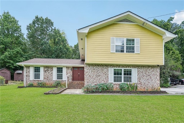 2201 Colonial Oak Way, Stone Mountain, GA 30087 - view of front of house featuring brick siding and a front yard