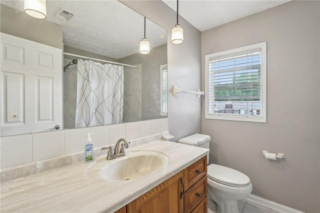 2201 Colonial Oak Way, Stone Mountain, GA 30087 - full bathroom featuring vanity, toilet, curtained shower, and baseboards