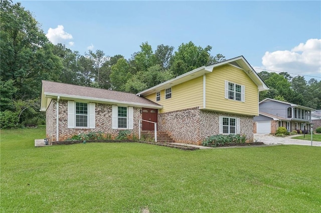2201 Colonial Oak Way, Stone Mountain, GA 30087 - tri-level home featuring brick siding, a front yard, and a garage