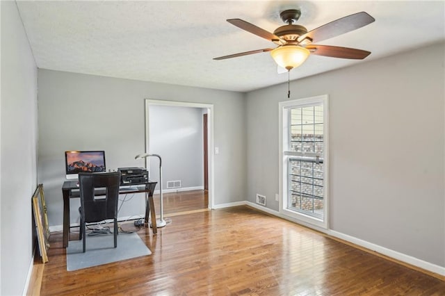 2201 Colonial Oak Way, Stone Mountain, GA 30087 - office featuring wood finished floors, ceiling fan, and baseboards