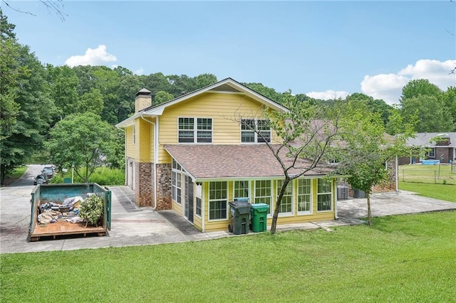 2201 Colonial Oak Way, Stone Mountain, GA 30087 - rear view of property featuring a patio area, a chimney, and a shingled roof