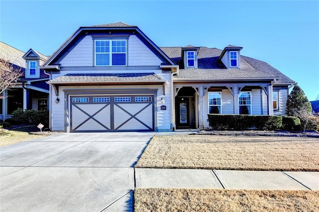 view of front facade featuring a garage and concrete driveway