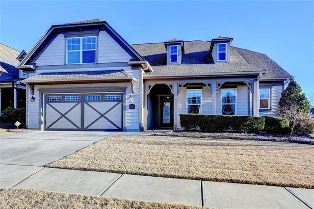 view of front of property featuring a garage