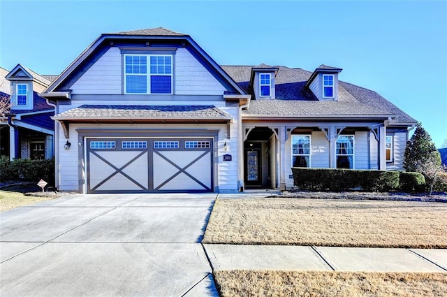 view of front of property with a garage