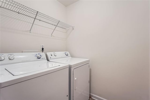 1963 Lakeshore Overlook Cir NW, Kennesaw, GA 30152 - washroom with independent washer and dryer, laundry area, and baseboards