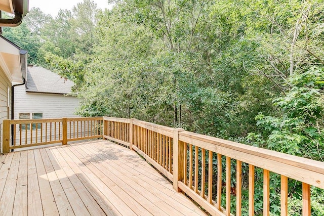 deck featuring a view of trees