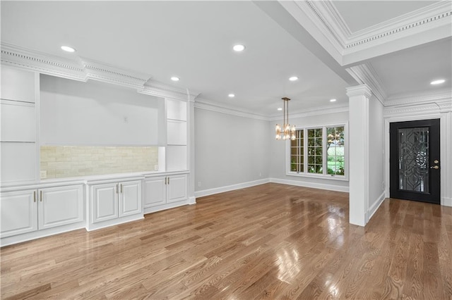 53 Paces W Dr NW, Atlanta, GA 30327 - interior space featuring decorative columns, a notable chandelier, baseboards, and ornamental molding