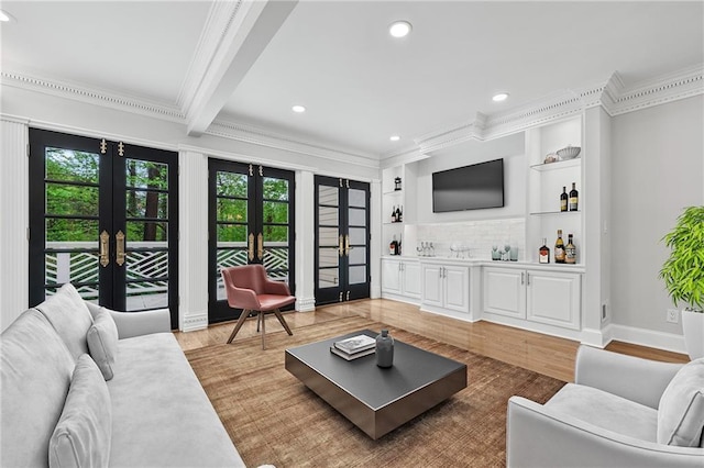 53 Paces W Dr NW, Atlanta, GA 30327 - living area with ornamental molding, recessed lighting, french doors, light wood finished floors, and baseboards