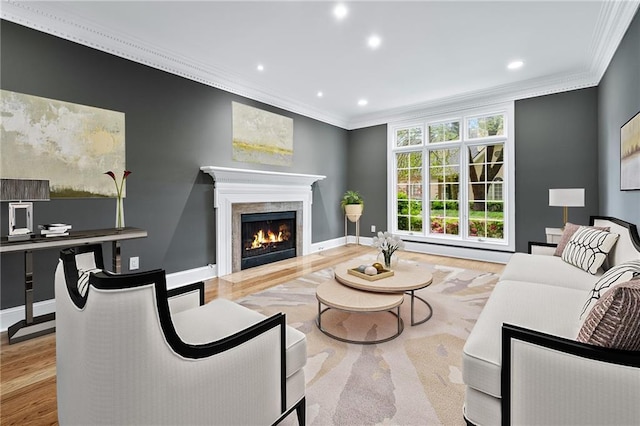 53 Paces W Dr NW, Atlanta, GA 30327 - living room with baseboards, a fireplace, crown molding, recessed lighting, and wood finished floors