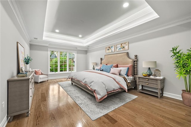 53 Paces W Dr NW, Atlanta, GA 30327 - bedroom featuring ornamental molding, recessed lighting, a raised ceiling, and wood finished floors