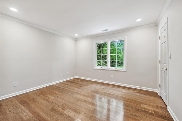 53 Paces W Dr NW, Atlanta, GA 30327 - empty room featuring crown molding, baseboards, recessed lighting, and wood finished floors