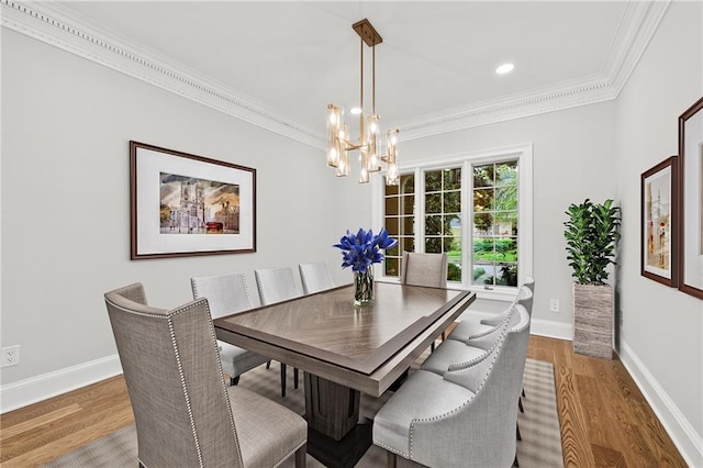 53 Paces W Dr NW, Atlanta, GA 30327 - dining area with crown molding, light wood finished floors, a notable chandelier, and baseboards