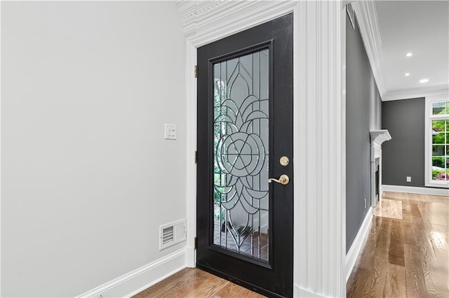 53 Paces W Dr NW, Atlanta, GA 30327 - entrance foyer with crown molding, visible vents, recessed lighting, wood finished floors, and baseboards