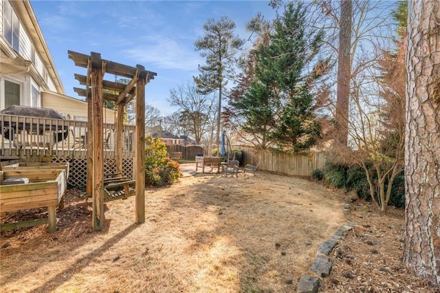 view of yard featuring a wooden deck