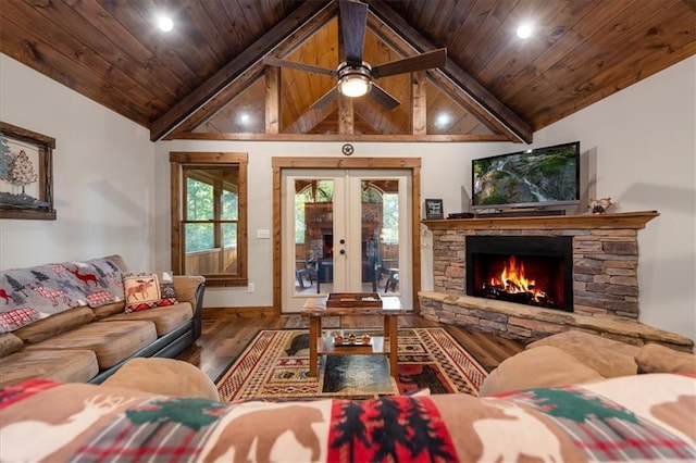 living room featuring a fireplace, hardwood / wood-style flooring, vaulted ceiling with beams, and wood ceiling