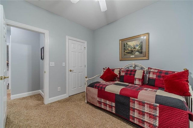 bedroom with ceiling fan and carpet