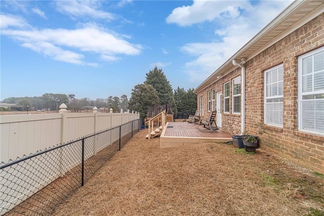 view of yard with a deck