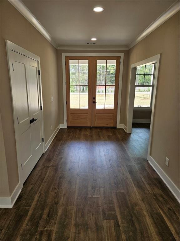 entryway with crown molding, dark wood-type flooring, recessed lighting, french doors, and baseboards