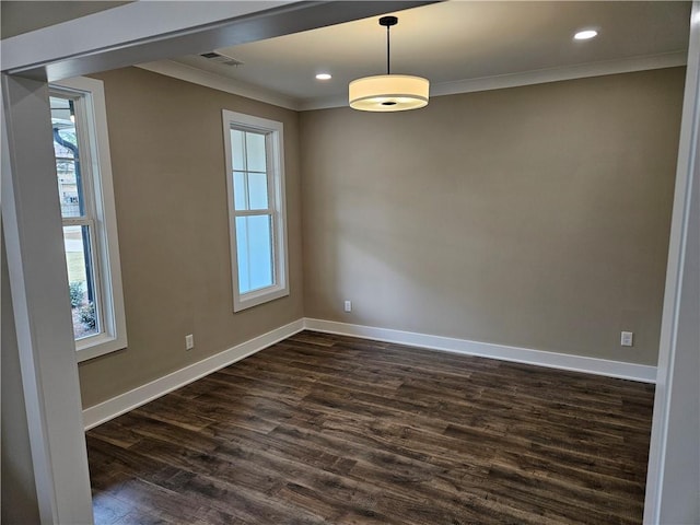 unfurnished room with recessed lighting, dark wood-style flooring, baseboards, and crown molding
