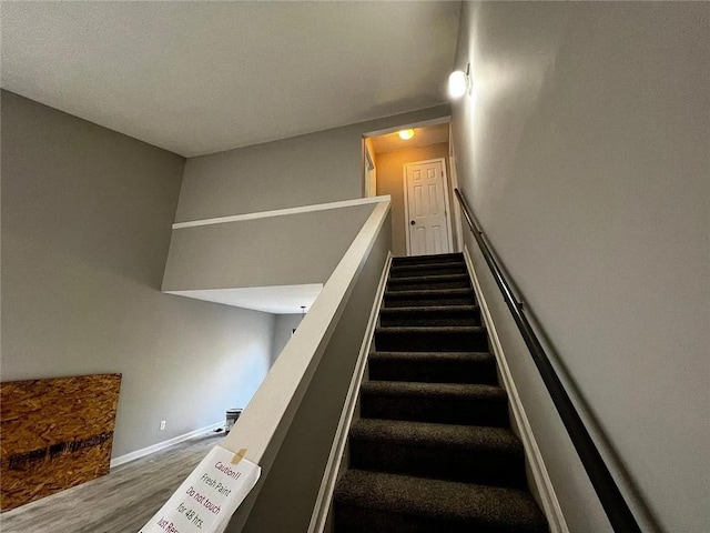 3932 Darryl Ln, Gainesville, GA 30506 - staircase featuring wood finished floors and baseboards