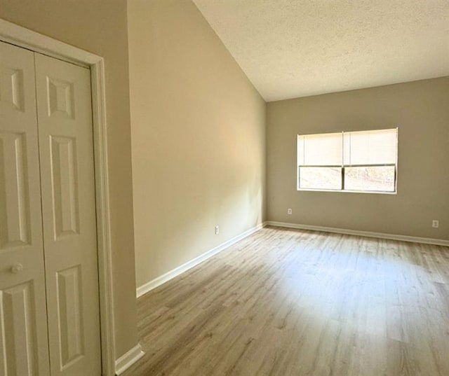 3932 Darryl Ln, Gainesville, GA 30506 - unfurnished room with wood finished floors, baseboards, and a textured ceiling