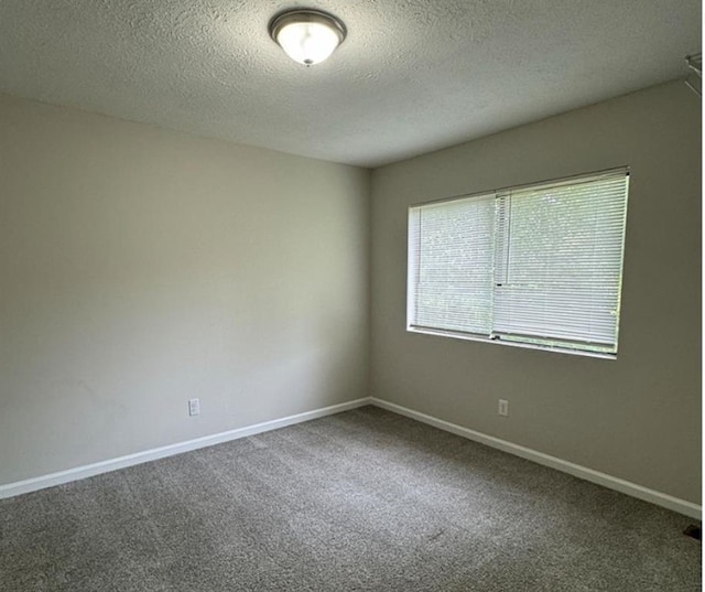 3932 Darryl Ln, Gainesville, GA 30506 - unfurnished room featuring carpet, baseboards, and a textured ceiling
