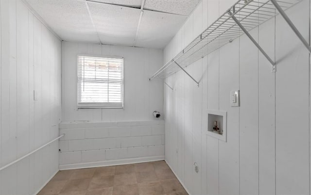 clothes washing area featuring washer hookup and laundry area