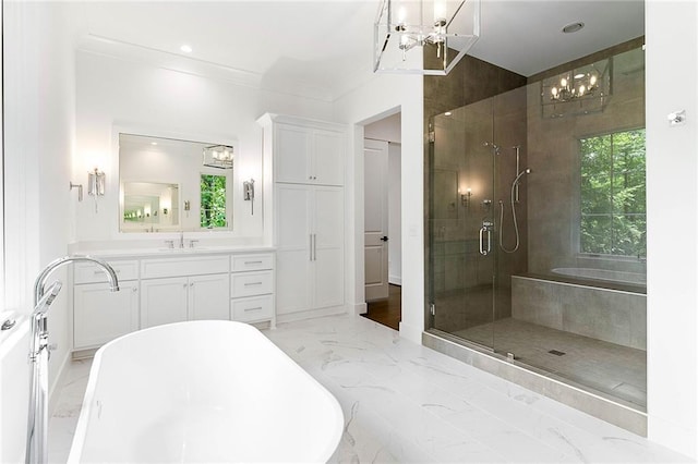 bathroom with vanity, shower with separate bathtub, and crown molding