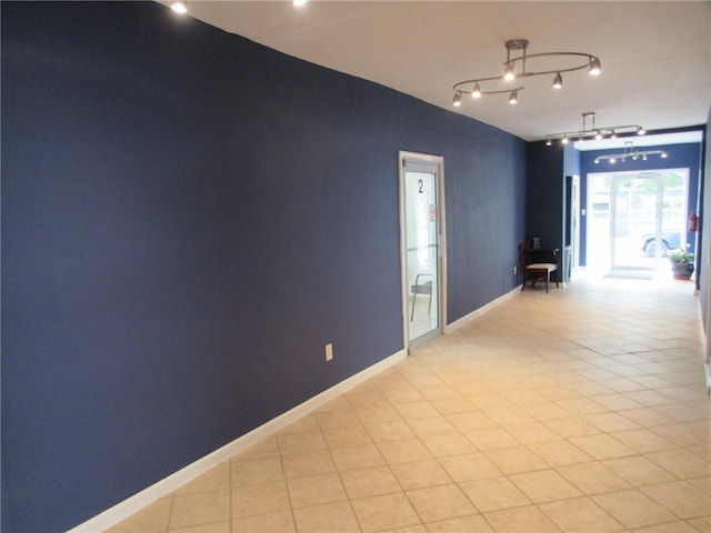 view of tiled spare room