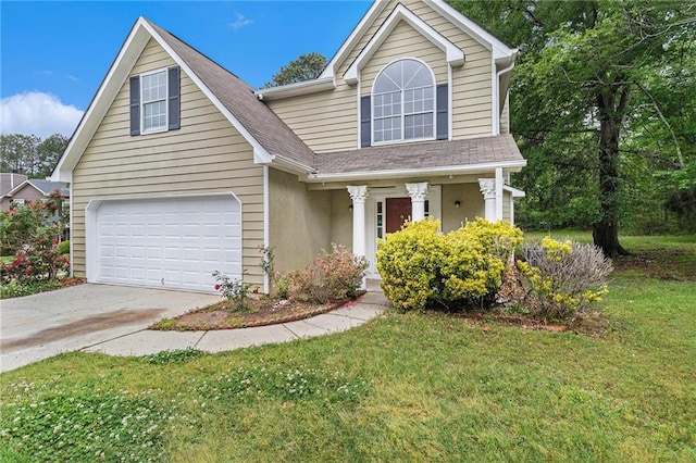 traditional-style home with a front lawn, roof with shingles, covered porch, and concrete driveway