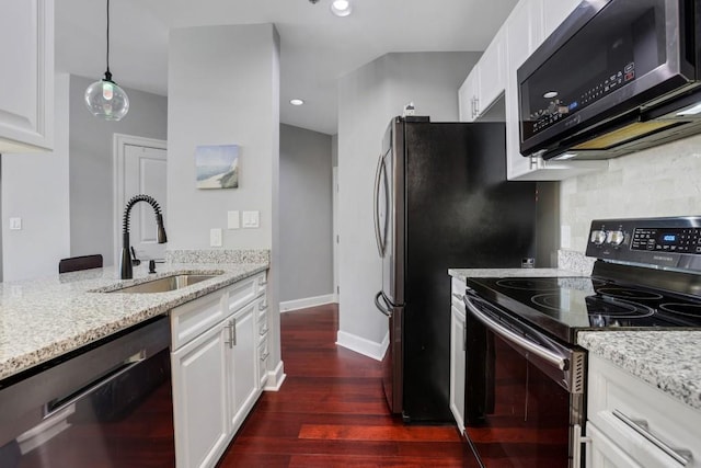 325 E Paces Ferry Rd NE Unit 1910, Atlanta, GA 30305 - kitchen with black electric range oven, dishwashing machine, light stone counters, dark wood-style flooring, and white cabinetry