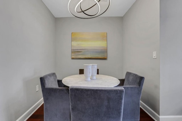 325 E Paces Ferry Rd NE Unit 1910, Atlanta, GA 30305 - dining room featuring dark wood-style flooring