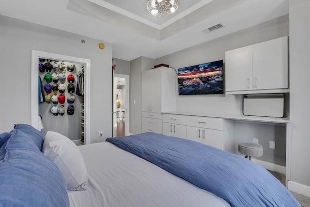 325 E Paces Ferry Rd NE Unit 1910, Atlanta, GA 30305 - bedroom with a raised ceiling and ornamental molding