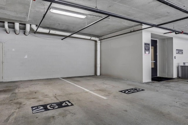325 E Paces Ferry Rd NE Unit 1910, Atlanta, GA 30305 - parking deck with concrete block wall