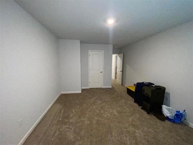 empty room with carpet flooring