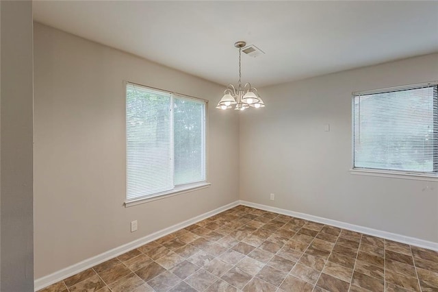 6200 Beaver Creek Trl, Atlanta, GA 30349 - unfurnished room featuring a chandelier and baseboards