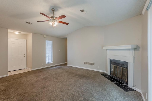 6200 Beaver Creek Trl, Atlanta, GA 30349 - unfurnished living room with carpet, a ceiling fan, a fireplace with flush hearth, and vaulted ceiling